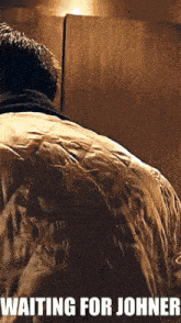 a poster for a movie called waiting for johner features a man in a jacket