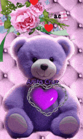a purple teddy bear holding a purple heart with anita cruz written on the bottom