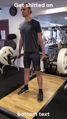 a man lifting a barbell in a gym with the words get shitted on bottom text