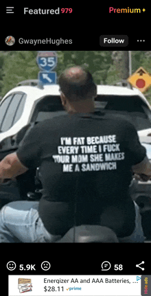 a man wearing a shirt that says i 'm fat