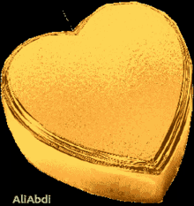 a picture of a gold heart with the name aliabdi on the bottom