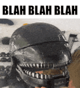 a person is holding a helmet that says blah blah blah on it