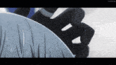 a close up of a person 's hand holding a knife in a video game .