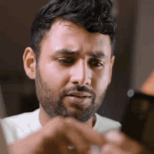 Checking Phone Arun Maini GIF