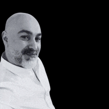 a man in a white shirt with a beard is surrounded by music notes and a heart