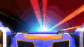 a blue and orange object with a red background