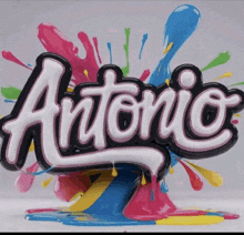 the word antonio is surrounded by splashes of paint