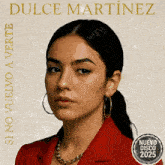 dulce martinez is featured on the cover of her new album
