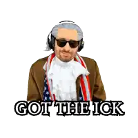 a man wearing headphones and a scarf with the words got the ick below him