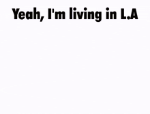 a cartoon character is standing next to a yellow truck that says " yeah i 'm living in l.a "