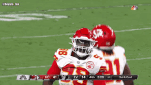 a football player with the number 98 on his jersey