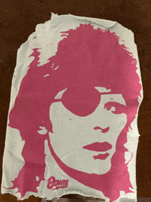 a piece of paper with a woman 's face and the word bowie