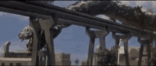 godzilla destroy all monsters manda manda coils a railway bridge coil