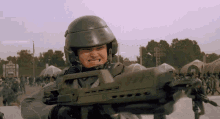 dizzy flores isabel flores isabelle flores dina meyer starship troopers movie 1997 shots fired shot shooting shooter gun automatic semi automatic