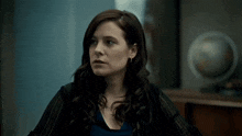 a woman says " i think she 's hiding something " in yellow letters