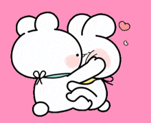 a cartoon of two rabbits hugging each other