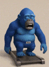 a blue gorilla is walking on a treadmill wearing a pair of ron shorts