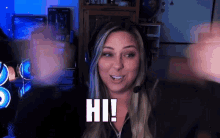 a woman wearing a headset is saying hi