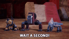 three robots are standing next to each other with the words wait a second on the bottom right