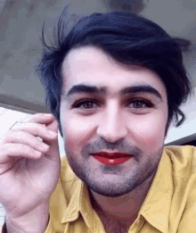 a man with a beard and lipstick on his lips