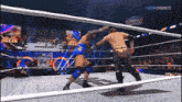two men wrestling in a ring with the words #men dynamite on the bottom right