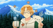 a boy in a hoodie with a maple leaf on it is holding a cup of coffee and a teddy bear .
