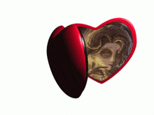 a pair of red heart shaped mirrors with a man in a mask on one