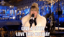 Kelly Clarkson Give A Little Love This Holiday GIF - Kelly Clarkson Give A Little Love This Holiday 91st Christmas In Rockefeller Center GIFs