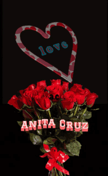 a bouquet of red roses and a heart with the name anita cruz