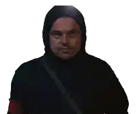a man wearing a black hooded jacket with a strap around his neck
