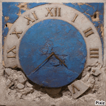 a blue and white clock with roman numerals including xii and ix
