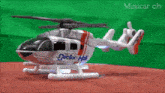 a toy helicopter that says doctor heli on the side