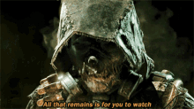 a scarecrow with the words all that remains is for you to watch above him