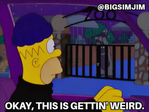Ok This Is Getting Weird The Simpsons GIF - Ok This Is Getting Weird The Simpsons Holding Up Baby Gorilla GIFs