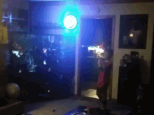 a room with a blue light on the wall
