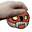 a hand is holding a red cartoon character with a mustache and fangs .