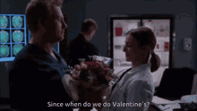 a man is holding a bouquet of flowers in front of a woman who says since when do we do valentine 's