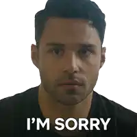 a man with a beard says i 'm sorry on a white background
