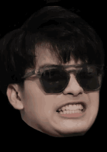 a man wearing sunglasses makes a funny face with his mouth open
