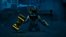 a lego figure with a hammer and a sword