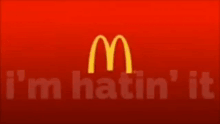 a red background with a mcdonald 's logo and i 'm hatin ' it