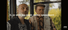 two men are sitting next to each other and the words ti ja sam jos uvek radno sposoban are above them