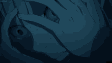 a close up of a person 's face with a blue background that says domino.tv