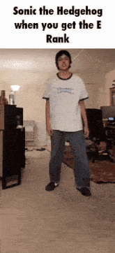 a man is standing in a room with the words sonic the hedgehog when you get the e rank written above him