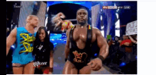 a wrestling match is being shown on a tv screen