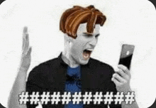 a man with red hair is holding a cell phone and yelling at it .