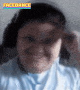 a blurred image of a person with facedance written on the top