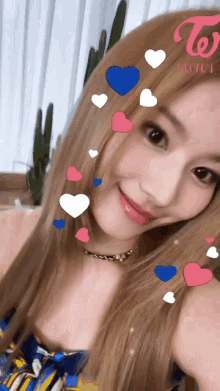 a close up of a woman 's face with hearts around her face