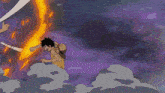 a man in a straw hat is standing in front of a large fire