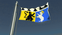 a blue and yellow flag with a lion and a ram on it